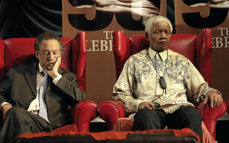 Jakes Gerwel, left, admonished South Africans not to idolise Nelson Mandela as some kind of saint.