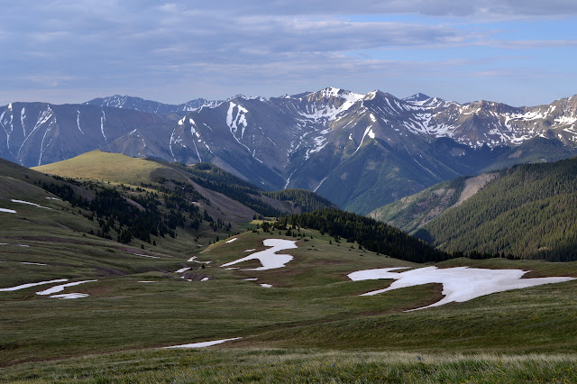 green hills below