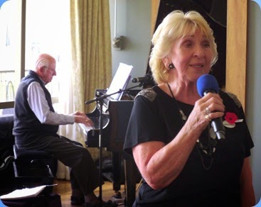 Margaret Black, our lovely host for the day, sang for us and accompanied by Rob Powell on the Kawai mini--grand piano.