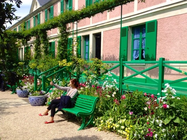 Pink building with green shutters at Giverny