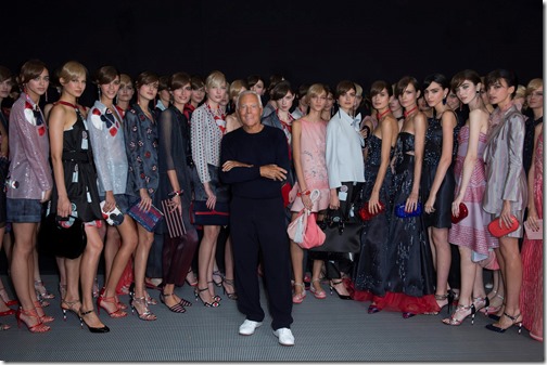 Giorgio Armani with models