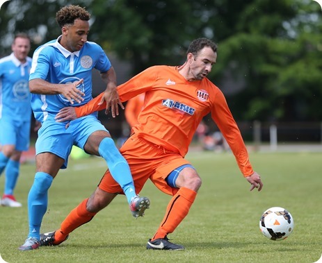 Nicky Maynard challenges Danny  Higginbotham for the ball