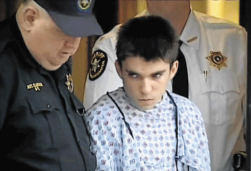 SLASHER: Alex Hribal in a hospital gown after his arraignment with sheriff's deputies in Export, Pennsylvania Picture: