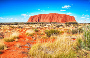 Uluru, or Ayers Rock, in the Northern Territory of Australia. The nearest large town, Alice Springs, is 450km away.