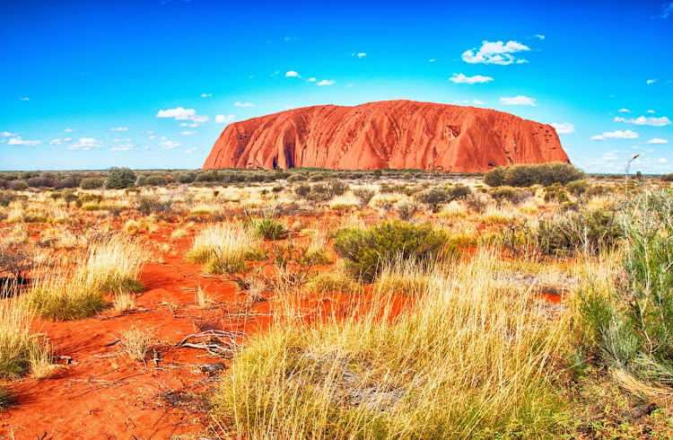 Uluru, or Ayers Rock, in the Northern Territory of Australia. The nearest large town, Alice Springs, is 450km away.