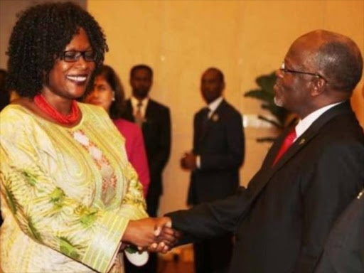 UNDP head Awa Dabo (L) pictured with Tanzanian President John Magufuli (R). /BBC