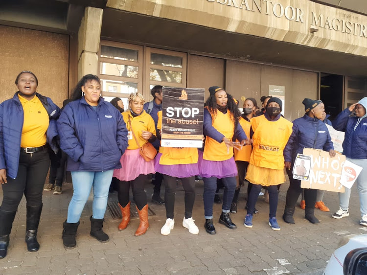 Protesters outside the Pretoria magistrate’s court on Tuesday, where Kenneth Debeila made his second appearance.