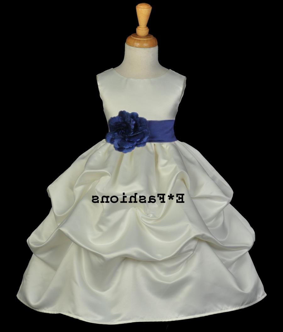  Color: Ivory   with Removable Navy Blue Tiebow sash with flower