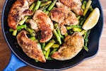One Pan Lemon Garlic Chicken and Asparagus was pinched from <a href="http://www.slenderkitchen.com/recipe/one-pan-lemon-garlic-chicken-and-asparagus" target="_blank">www.slenderkitchen.com.</a>