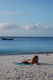 Lying on the beach in Nungwi