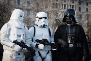 Members of the 501st Legion, a costume group, take part in a Star Wars Parade in Milan.