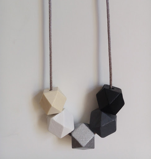 Title 2, Geometric wood bead necklace