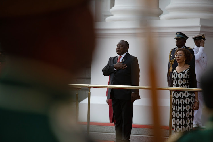 President Cyril Ramaphosa stands for the national anthem during the state of the nation ceremony in the national assembly in Cape Town. Picture: BLOOMBERG/DWAYNE SENIOR