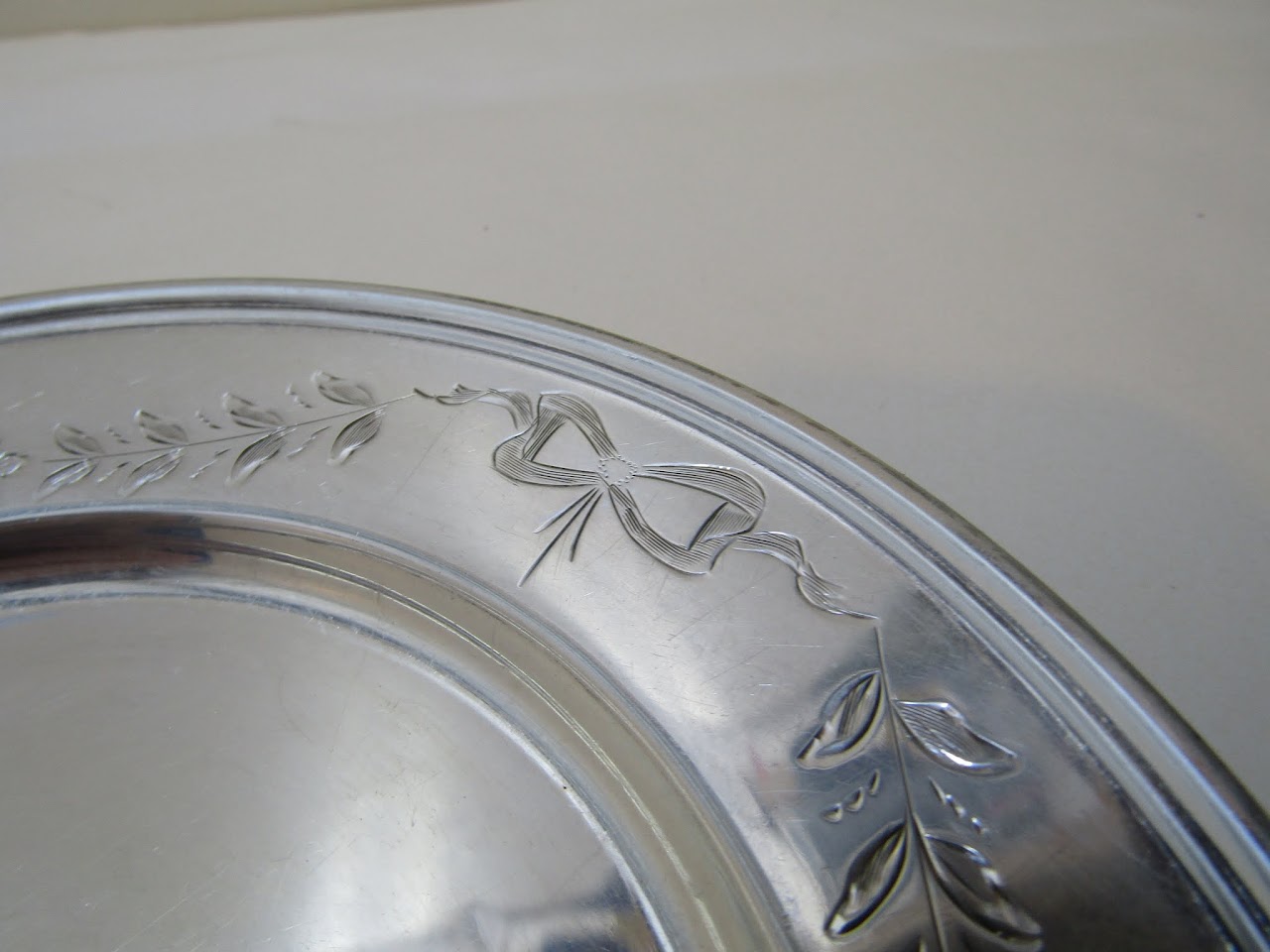 Set of 12 Sterling Silver Floral Motif Plates