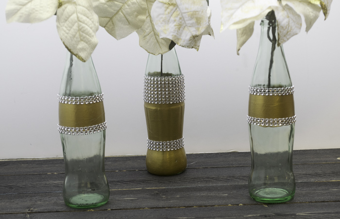 gold holiday coke bottles.jpg gold holiday coke bottles