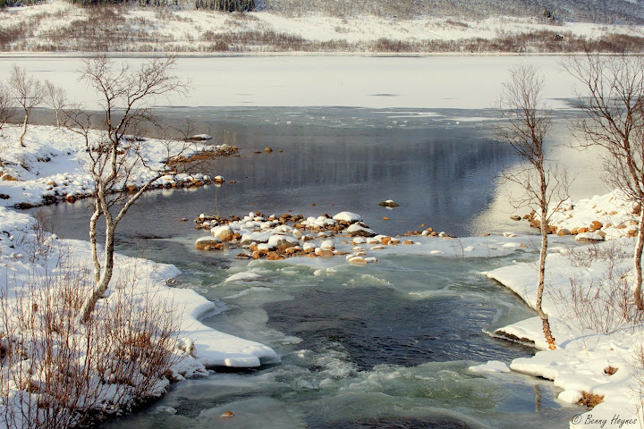 Frozen river. Winter Storm Kyrre, Northern Norway