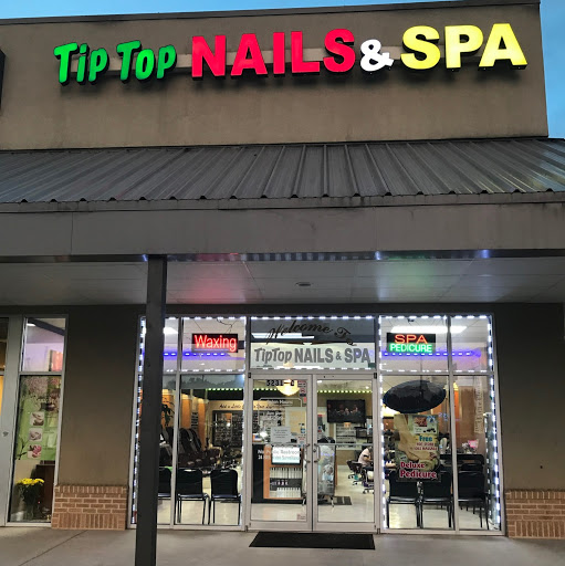 Tip Top Nails & Spa logo