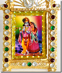 [Framed Radha-Krishna pic]