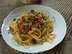 Spaghetti con stoccafisso e pomodorini