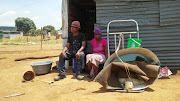 Robert Makete and his wife, Olivia Makete, outside their shack in Orange Farm. The couple were among a number of people assaulted by ANC members outside Luthuli House on Monday.