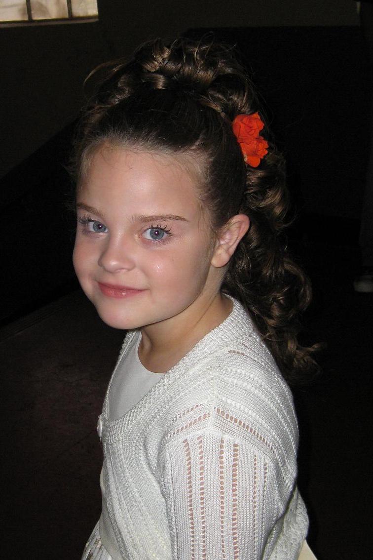 Flower girl with orange spray