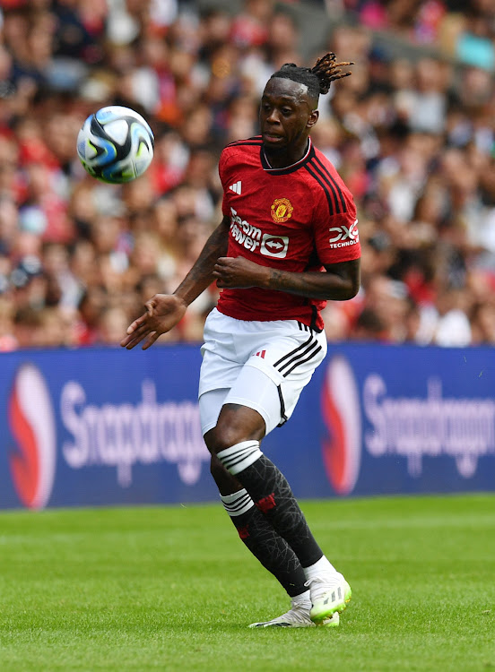 Aaron Wan-Bissaka of Manchester United in action during the pre-season friendly match between Manchester United and Olympique Lyonnais at BT Murrayfield Stadium on July 19, 2023 in Edinburgh, Scotland.