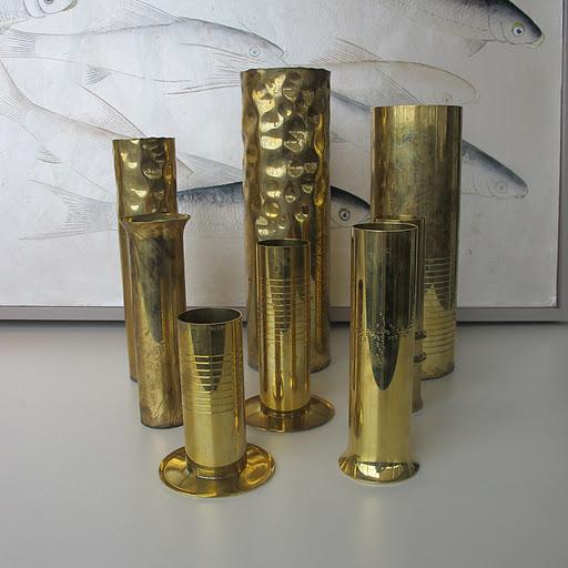 This grouping of brass vases