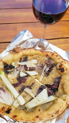 Pizza alla Bagna Cauda Fennel and Radicchio on a base of blended Sicilian Anchovies, Butter, Olive Oil, Garlic and Crushed Red Pepper paired with Teutonic Alsea Estate Pinot Noir