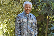 Nelson Mandela in one of his trademark Madiba shirts.  File photo.