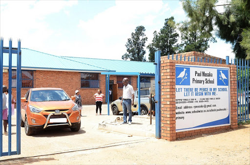 November 14,2016. The elder sister of Nothemba Lebepe, the principal of Paul Mosaka Primary School in Pimville, drives her car off the school grounds after the principal was attacked .Pic. Mduduzi Ndzingi. © Sowetan