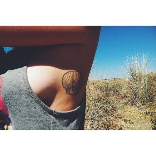 shell_side_boob_tatuagem