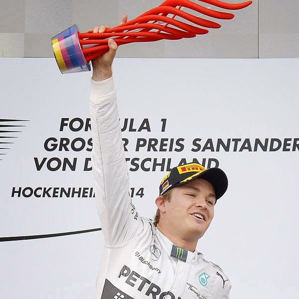 German Formula One driver Nico Rosberg of Mercedes AMG GP celebrates on the podium after winning the German Formula One Grand Prix at the Hockenheimring race track in Hockenheim, Germany, 20 July 2014. 