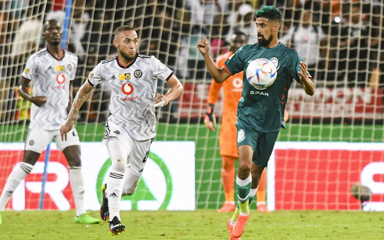 Miguel Timm of Orlando Pirates challenges AmaZulu's Abbubaker Mobara in the MTN8 final at Moses Mabhida Stadium in Durban on November 5 2022.