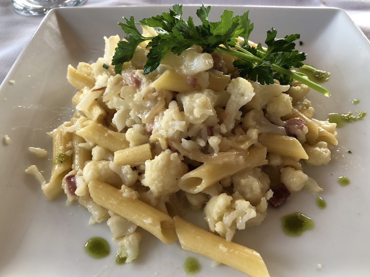 Pasta with cauliflower, pancetta, olive oil, and Pecorino.