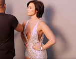 DEMI LOVATO BUSTS OUT OF CHEEKY LINGERIE