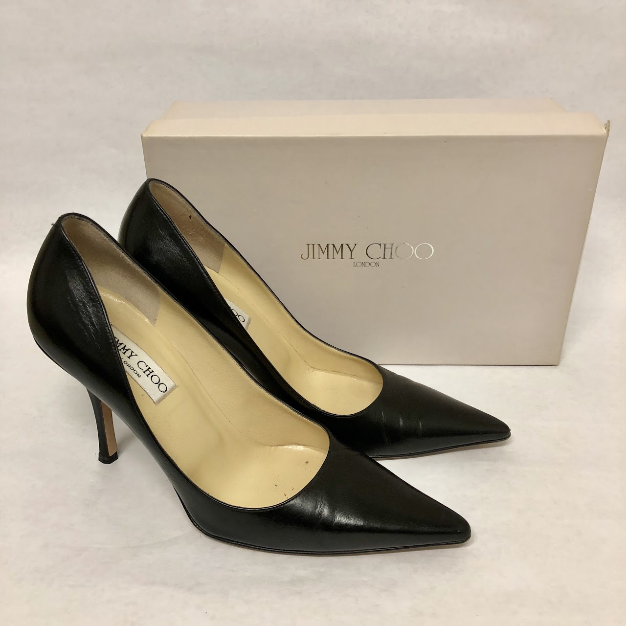 JImmy Choo Black Leather Pumps