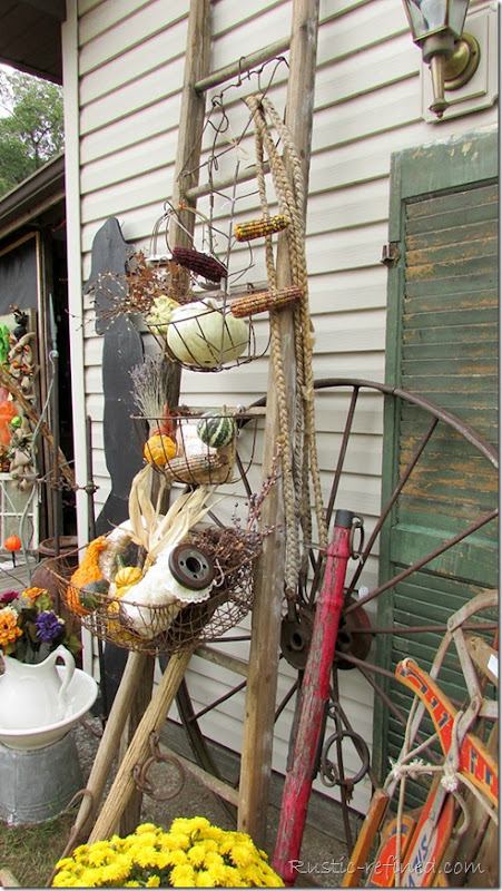 Salvage antique ladder and wire baskets