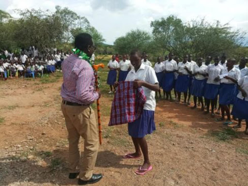 Best preformed pupil rewarded at Ngoron Primary school in Tiaty, Baringo County on August 23. /JOSEPH KANGOGO