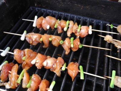 Chicken Yakitori uncooked on grill 400