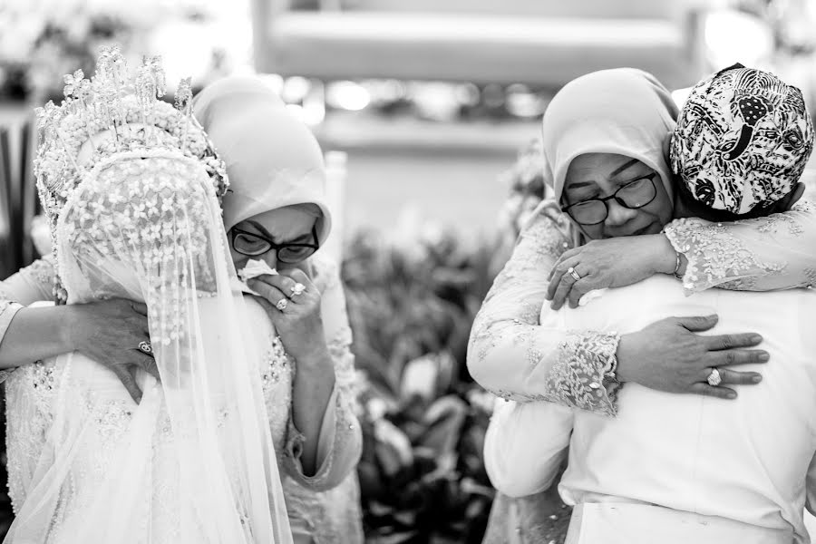 Fotografo di matrimoni Adhi Superpanda (adhi). Foto del 26 dicembre 2023