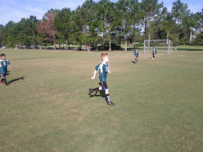 Toby breaks to the middle on the soccer field