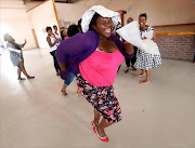 Elizabeth Tyongwana celebrates her daughter's results after a bumper number of pupils wrote matric.