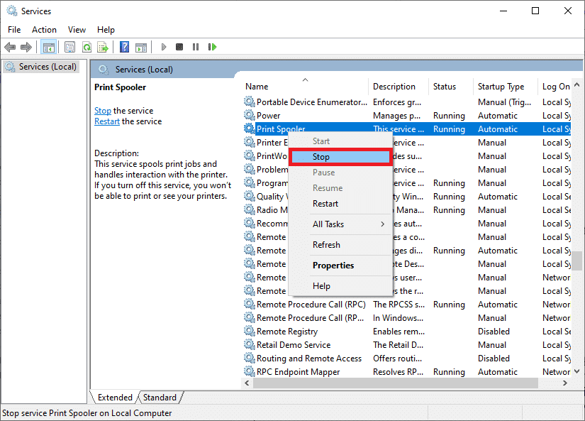 in het venster Services bladert u naar beneden en zoekt u naar Print Spooler en klikt u er met de rechtermuisknop op.  Selecteer de optie Stop