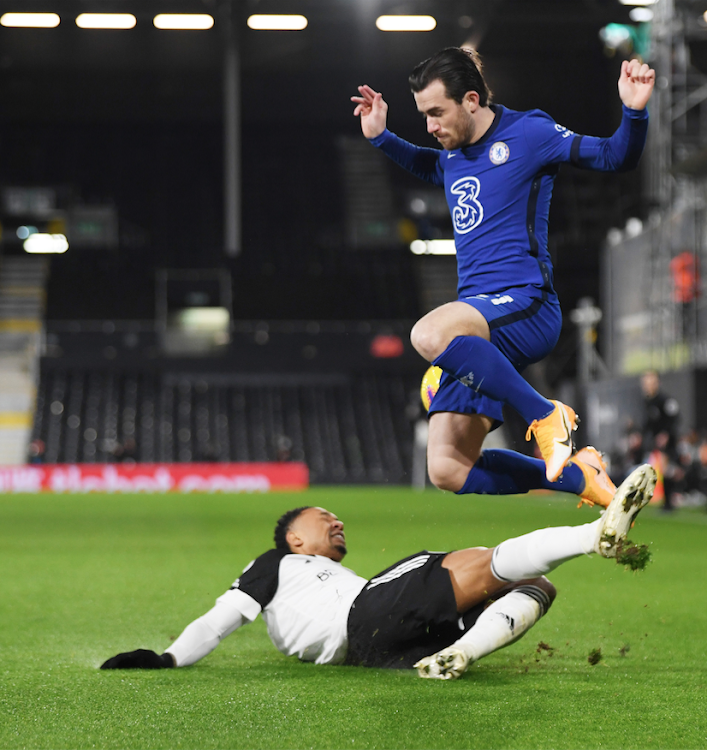 Chelsea's Ben Chilwell in action with Fulham's Kenny Tete