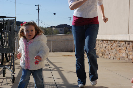 We ran up and down the sidewalk to kill some time at Cafe Java - the regular breakfast spot for our visit. RC had fun.
