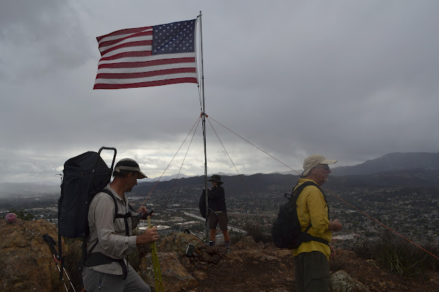 geocachers at the flag