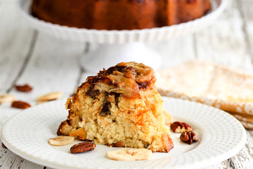 A slice of Caramel Pecan Banana Cake on a plate.