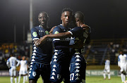 Bidvest Wits Zimbabwean striker Terrence Dzukamanja of celebrates with teammates after scoring a goal.   