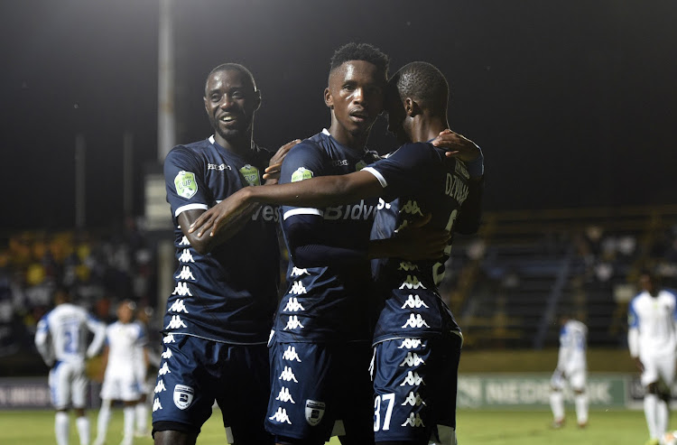 Bidvest Wits Zimbabwean striker Terrence Dzukamanja of celebrates with teammates after scoring a goal.