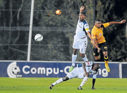 ON THE UPROAD: Bidwest Wits’ new captain Thulani Hlatshwayo, top left, has powered his way through the first half of the season. With him in this file picture from a Premiership match at Bidvest Stadium in December are Bidwest Wits teammate Phumlani Ntshangase and Bernard Parker of Kaizer Chiefs Picture: GALLO IMAGES